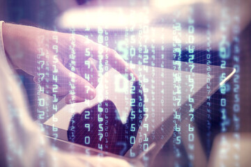 Multi exposure of man's hand holding and using a digital device and data theme drawing. Innovation concept.