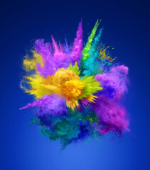 Bright colorful explosion of powder on blue background