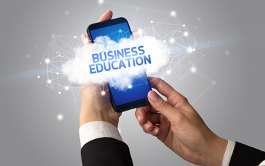 Hand using smartphone with cloud business concept