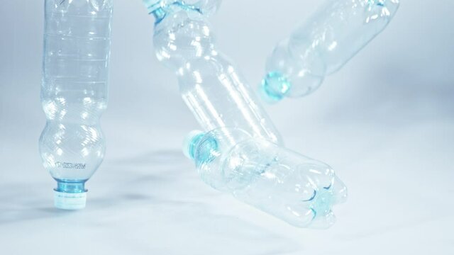 Super Slow Motion Shot of Falling Empty Plastic Bottles at 1000fps.