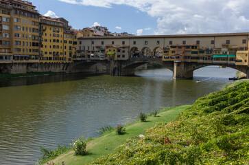 Fototapeta premium Ponte Vecchio view with Arno river with cityscape of Florence, Italy