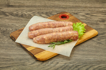 Raw pork meat sausages for grill