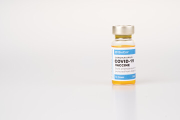 Vaccine bottle with white background.