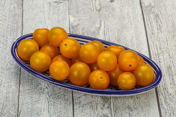 Fresh yellow cherry tomato heap