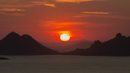 Landscape of distant Aegean islands as seen through Turgutreis, Turkey, during an adorable sunset.