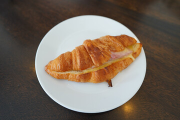 fresh croissant on a plate