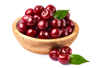 wooden bowl of sweet cherry fruits isolated on white background