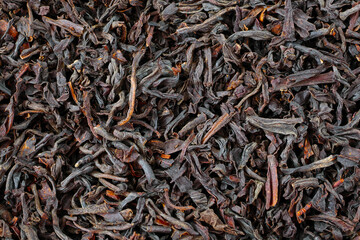 macro of black loose long leaf tea, loose tea  texture