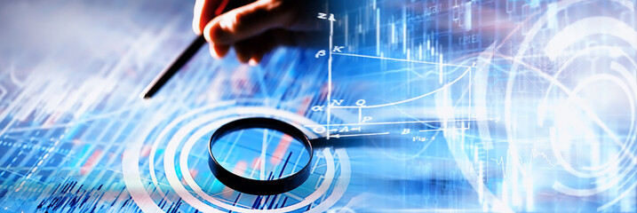 Business concept. Information technology and data processing. Hands over the screen with graphic data. A modern software product in business.