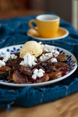 
sweet dessert made of pancakes, chocolate, ice cream and marshmallows