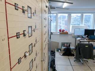 Vintage control and protection panels of power plant with single line diagrams.