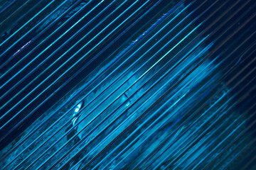 Background image, representing layers of blue glass sections.