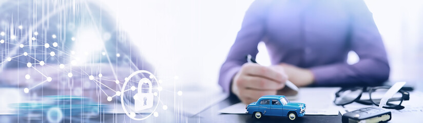 The insurance agent signs a document. Car insurance policy. Auto insurance policy. Forms for...