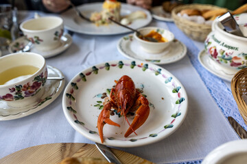 still life with food on a white plate on a white table on a sunny veranda 