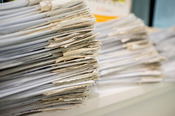 Shop desk full of guest orders sheets