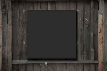 Fototapeta premium Blackboard on wooden background with space for text