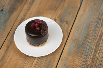 Tasty chocolate cake on table