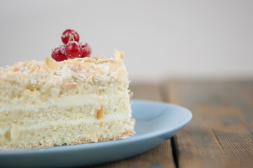 Delicious of piece cake on plate on wood table