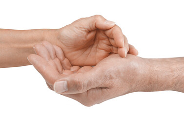 Male and Female Sensing each others palm chakra energy - female hand cupped across male open palm isolated on white background
