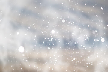 blue snowfall bokeh background, abstract snowflake background on blurred abstract blue