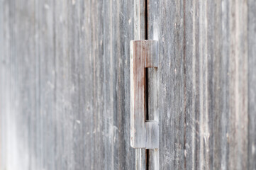Wooden handle on a barn door