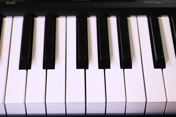 Old piano keys. close up view.effect back and white color, musical instrument background concept