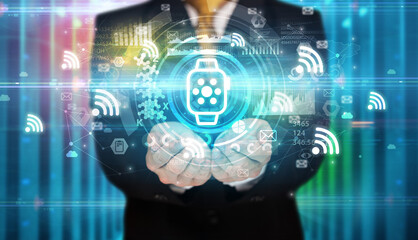 Businessman holding technology icon concept