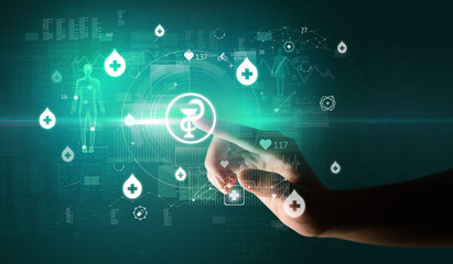 Doctor hand pressing futuristic health device with medical symbol on screen