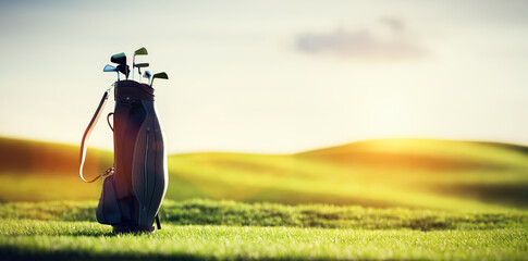 Naklejka na ściany i meble Golf clubs in bag at golf course resort
