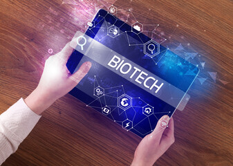 Close-up of a tablet searching inscription