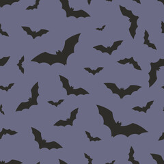 Flying bats on violet background. Seamless pattern. Clipping mask used.