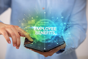 Businessman holding a foldable smartphone, new business concept