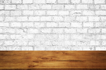 The background is blank wooden boards and a textured brick wall with lighting and vignetting.