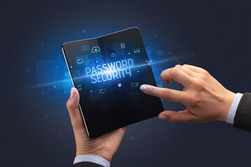 Businessman holding a foldable smartphone, security concept