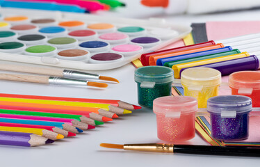 School Art Supplies on a White Table