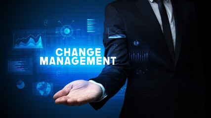 Hand of Businessman holding motivational message