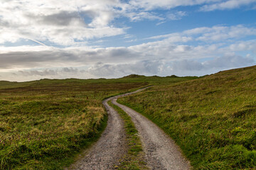 Fototapeta na wymiar A Narrow Road on the Island of North Uist in the Hebrides