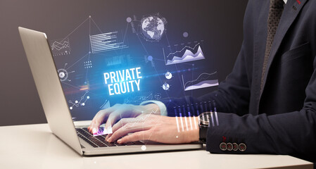 Businessman working on laptop, business concept