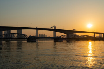 Fototapeta na wymiar Dawn with the bridge in the morning