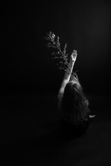 details of the body and the branch of the plant, fuzzy and delicate film black and white photo