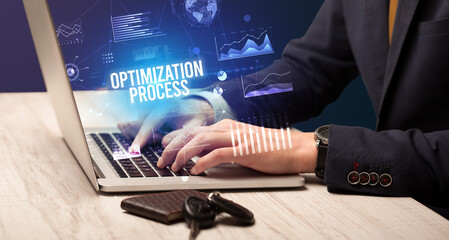 Businessman working on laptop, business concept