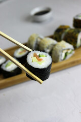 Fried rolls, classic on a wooden tray.