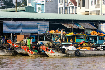 Transport ships on the Mekong River in Cai Be, Mekong Delta, Vietnam, Southeast Asia