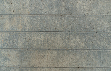 ฺBackgound and textured of cement floor with longitudinal stripes. For road construction.