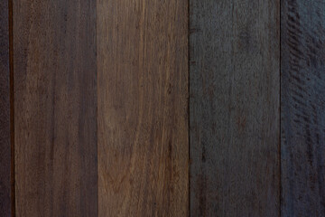 Background and textured of wood panels are painted with dark lacquer.