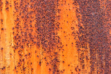 Rusty painted metal surface with flecks and scratches