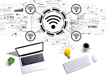 Wifi theme with computers with a light bulb
