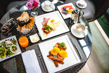 Full American Breakfast Huge healthy breakfast spread on a table with coffee Breakfast served with coffee English breakfast fried egg