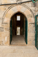 Fototapeta na wymiar The entrance to the Bab al-Silsila minaret from the inner schoolyard of the Madrasah are on the Temple Mount in the Old Town of Jerusalem in Israel