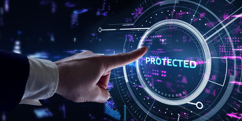 Cyber security data protection business technology privacy concept. Young businessman  select the  Protected on the virtual display.